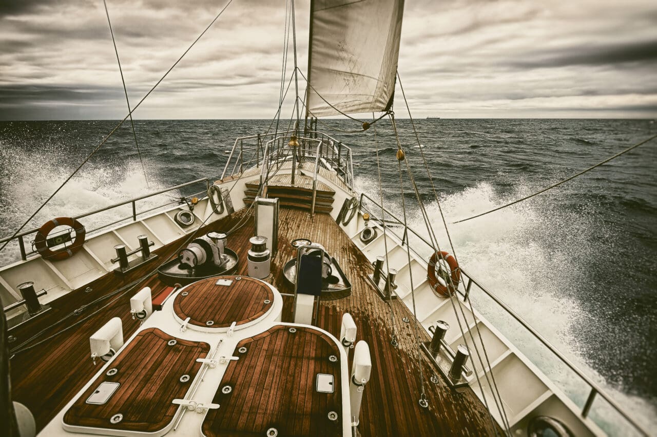 Sailing ship navigating the sea to stay the course